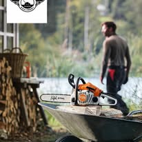 Stihl chainsaw on a wheelbarrow